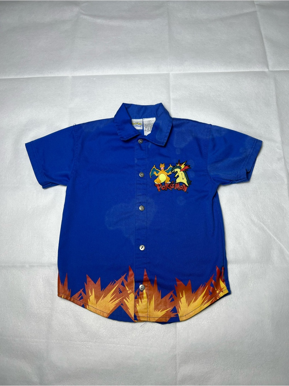 Pokemon blue button up shirt with Charizard design